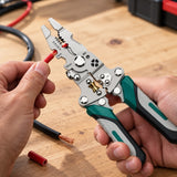 Stripping a red cable with the 12-in-1 Folding Wire Stripper
